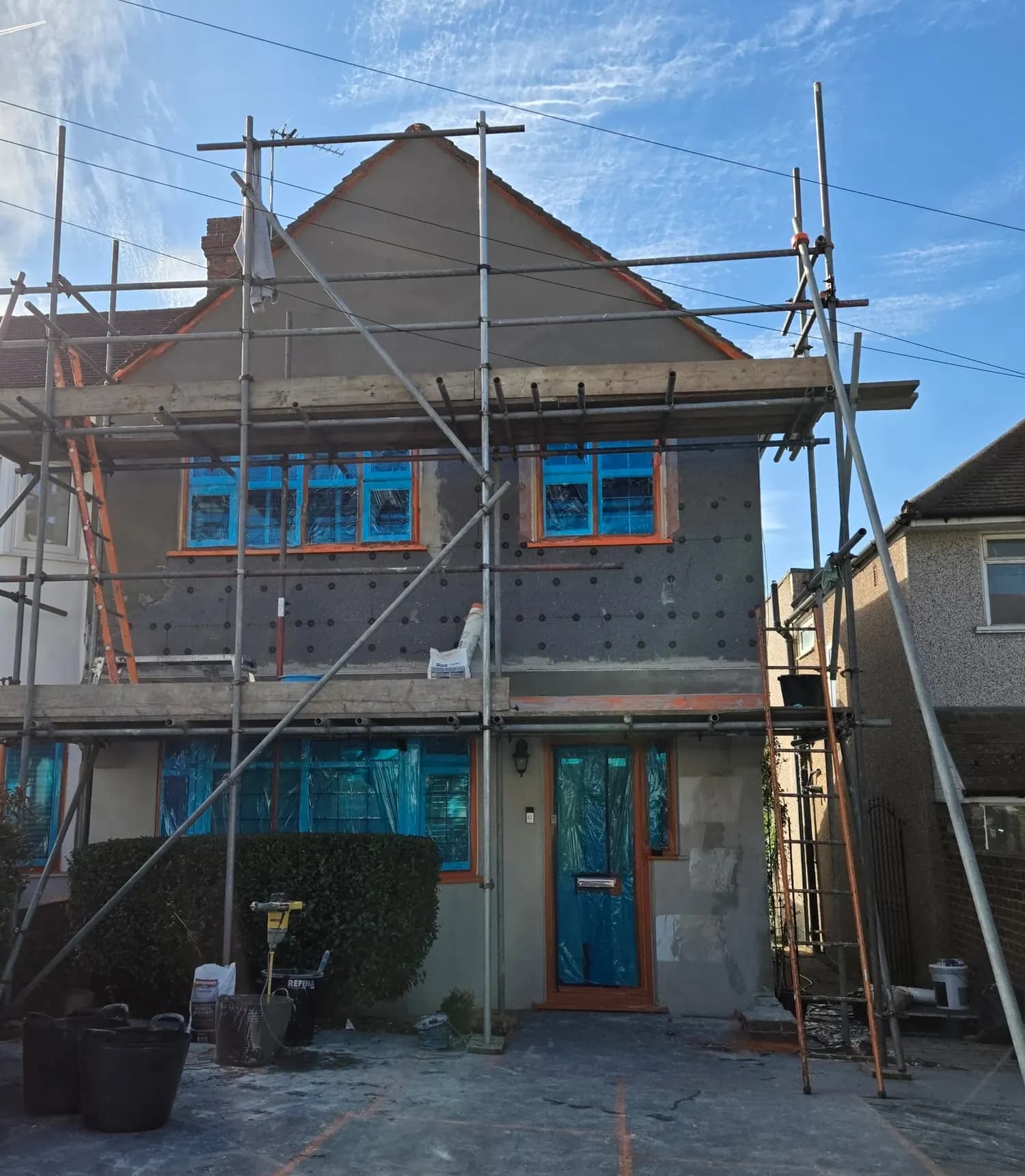 Front upper portion of house in Kent before external wall insulation and silicone render